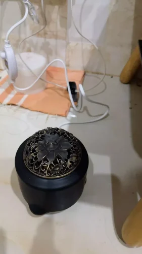 Lư xông trầm bằng điện Hắc Nê photo review